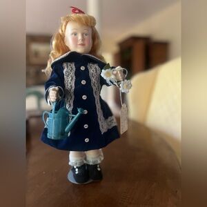 Blue and White Doll with Watering Can